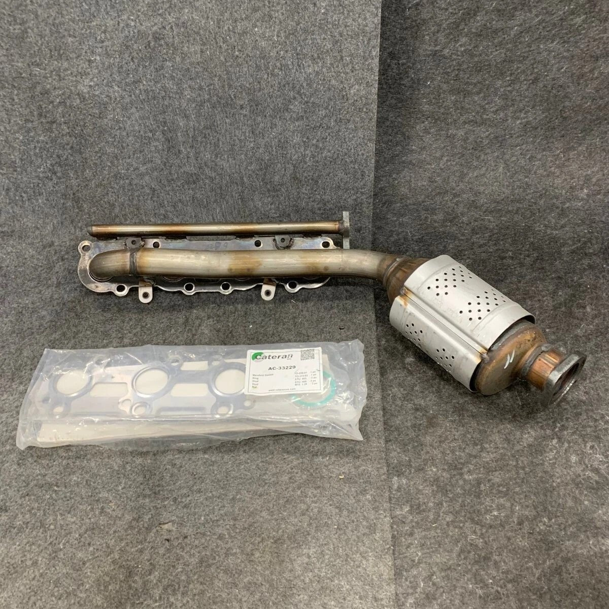 Catalytic Converter with Integrated Exhaust Manifold Left Cateran 33229